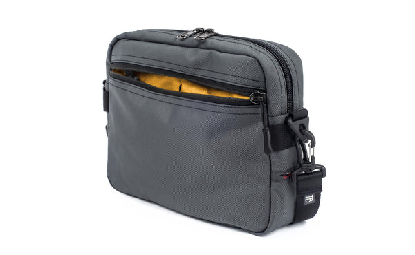 The Side Kick in Nebulous Grey (medium grey) Ballistic with an Marigold (yellow with white grid) 200 Halcyon interior.